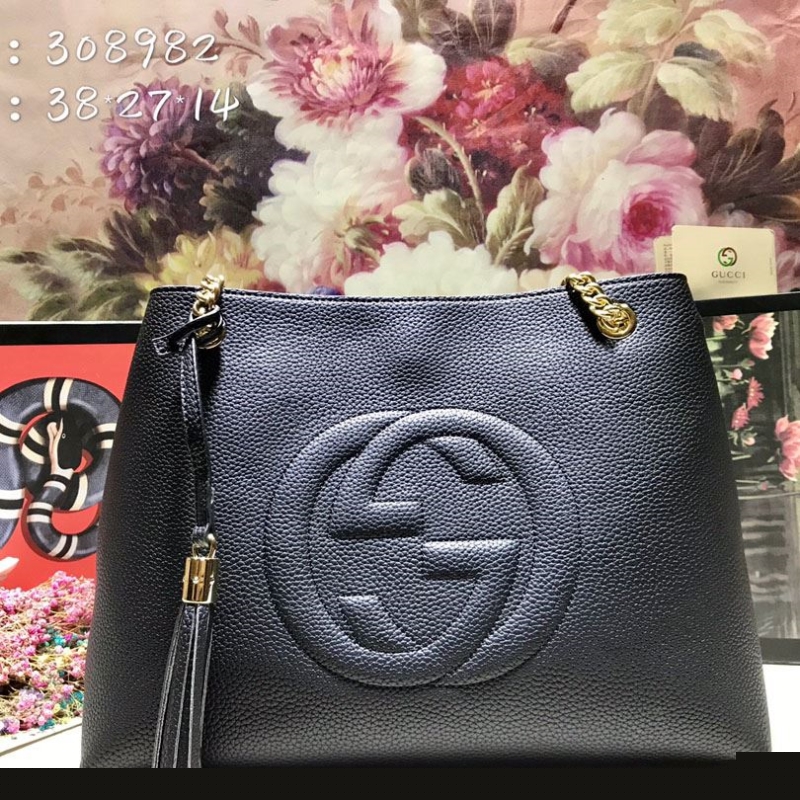 G*u*i shopping bags